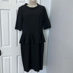 Very flattering grey career/ office dress.